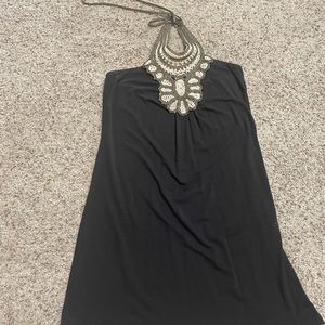 Cute knit summer dress that ties around neck.